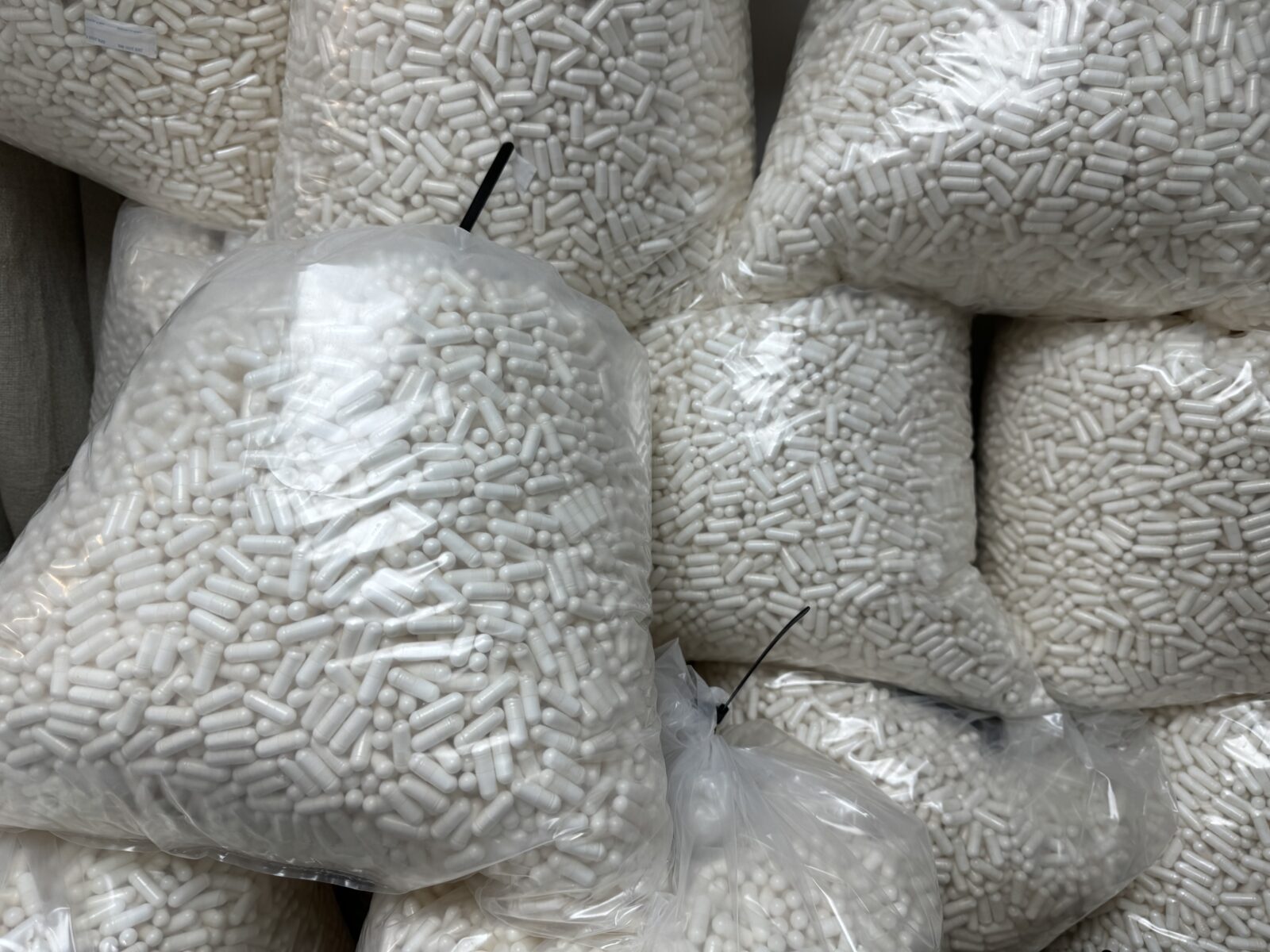 image of bags full of capsules